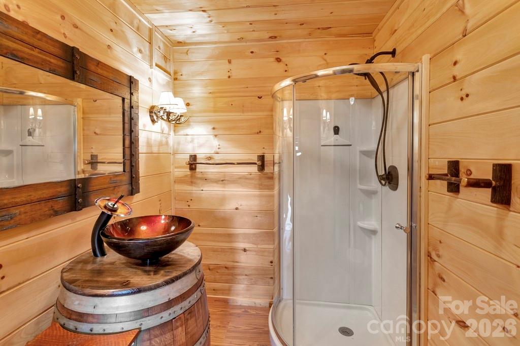 35 Falcon Crest Loop Maggie Valley, NC 28751 - Photo 32 of 46 a bathroom with a toilet and a shower