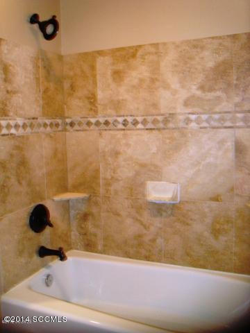 64 Camino Pesqueira Rio Rico, AZ 85648 - Photo 8 of 10 a bathroom with a shower