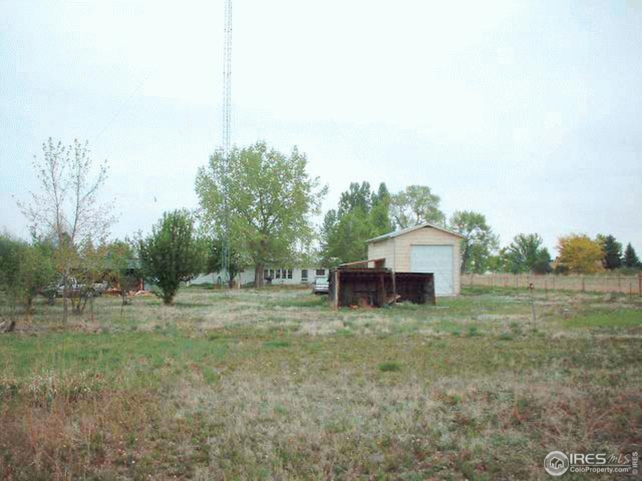 12198 Jasper Road Erie, CO 80516 - Photo 3 of 4 a view of a house with a outdoor space