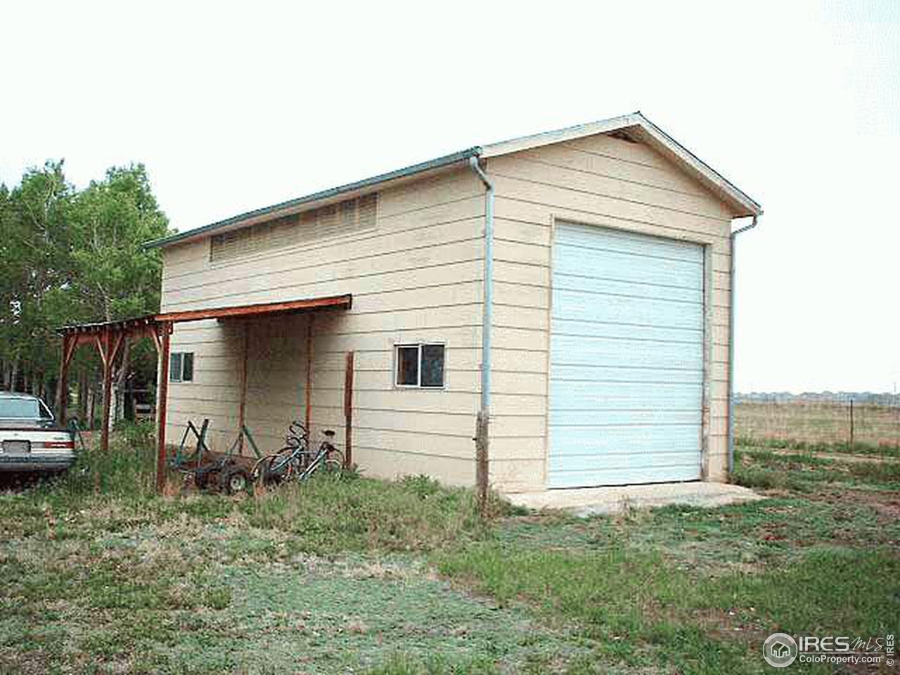 12198 Jasper Road Erie, CO 80516 - Photo 4 of 4 a view of a house with a yard