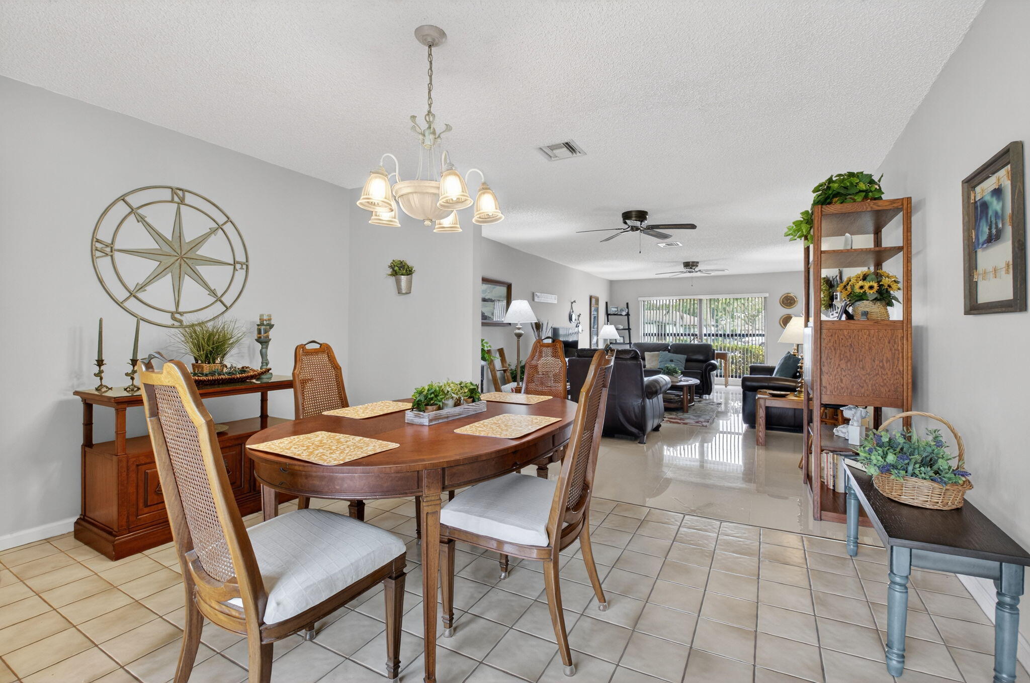 4972 Dovewood Road, Unit B Boynton Beach, FL 33436 - Photo 13 of 47 a view of a dining room with furniture