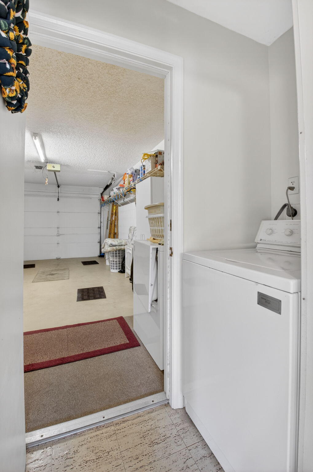 4972 Dovewood Road, Unit B Boynton Beach, FL 33436 - Photo 18 of 47 a kitchen with a refrigerator and stove