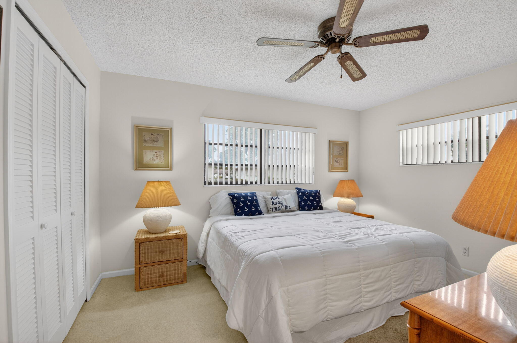 4972 Dovewood Road, Unit B Boynton Beach, FL 33436 - Photo 25 of 47 a bedroom with bed and window