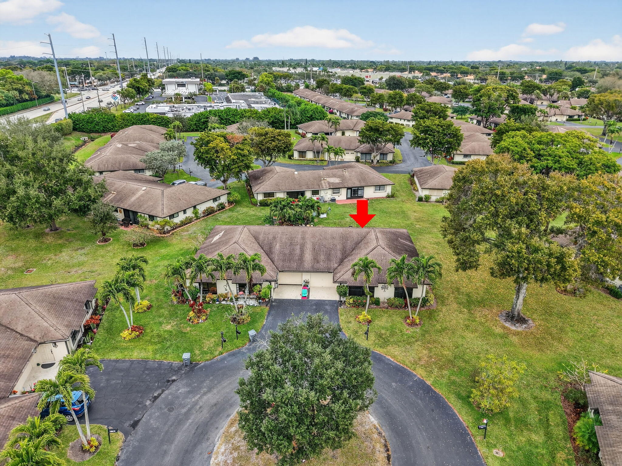 4972 Dovewood Road, Unit B Boynton Beach, FL 33436 - Photo 38 of 47 an aerial view of a house with a yard
