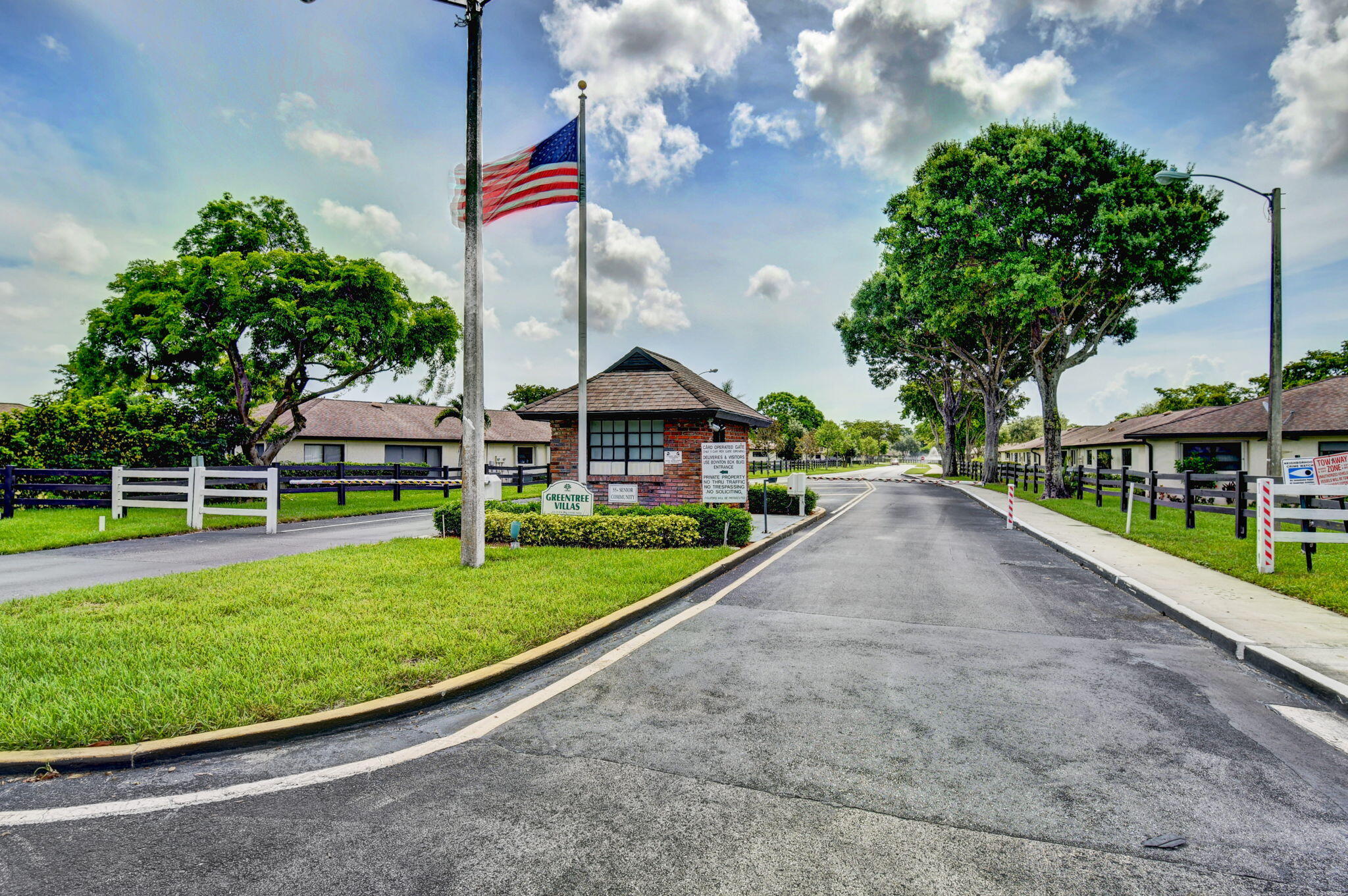 4972 Dovewood Road, Unit B Boynton Beach, FL 33436 - Photo 46 of 47 a view of an house with backyard and entertaining space