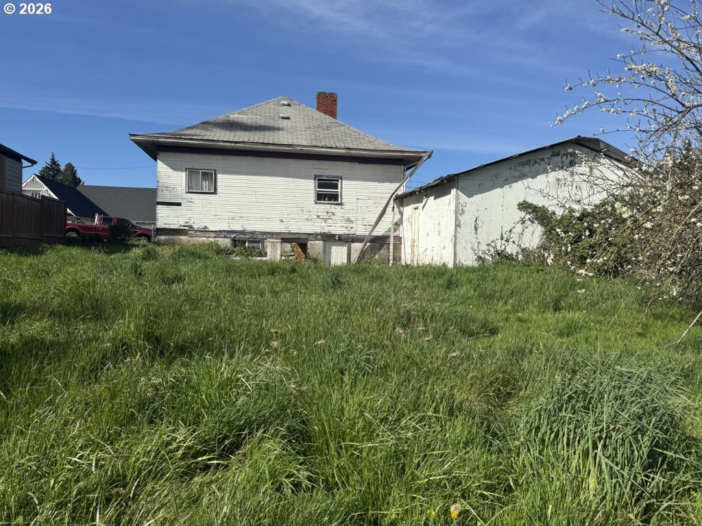 211 Church Street Amity, OR 97101 - Photo 4 of 7 a front view of a house with a yard
