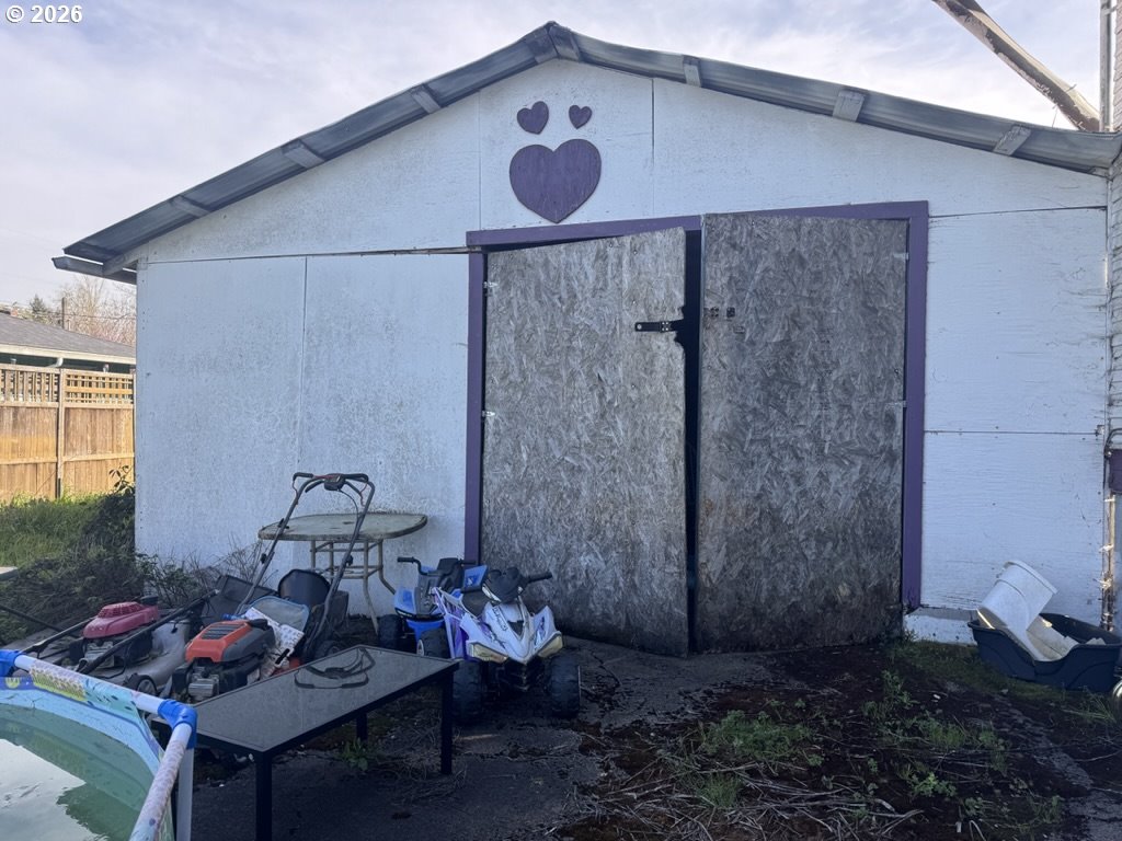 211 Church Street Amity, OR 97101 - Photo 7 of 7 a backyard of a house with seating space