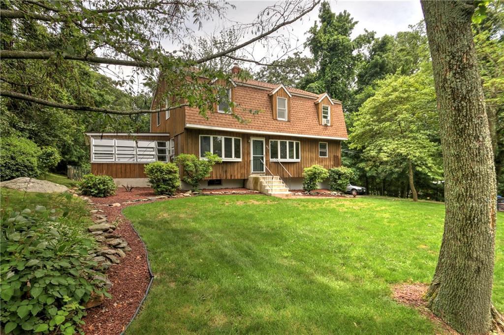 296 Moose Hill Road Monroe, CT 06468 - Photo 1 of 1 a front view of a house with garden