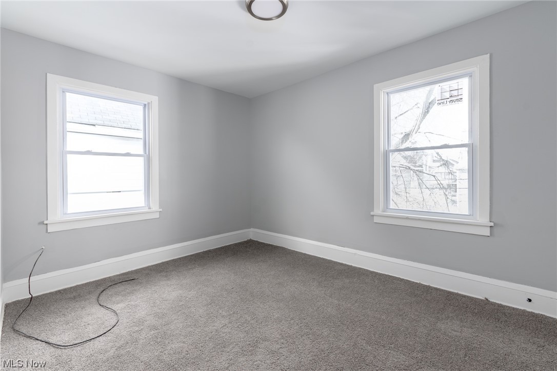 1228 Melbourne Road Cleveland, OH 44112 - Photo 18 of 35 View of carpeted empty room