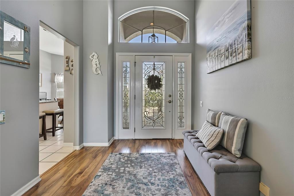 8472 Maybelle Drive Weeki Wachee, FL 34613 - Photo 11 of 58 a living room with furniture and a window