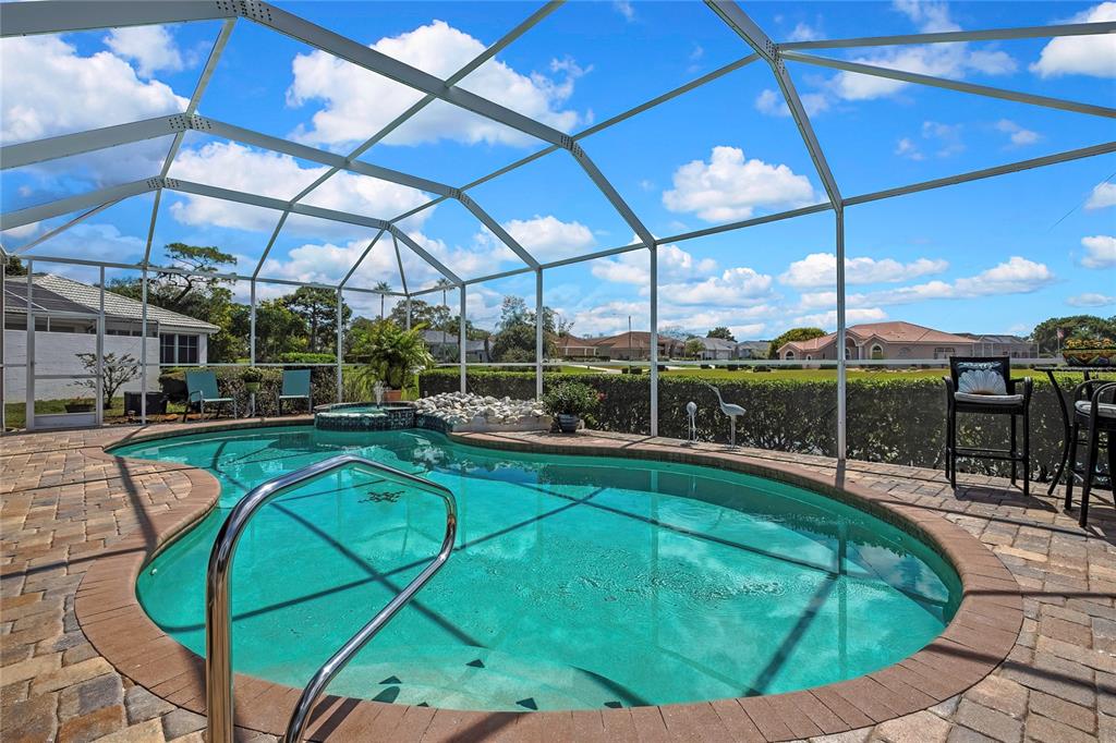 8472 Maybelle Drive Weeki Wachee, FL 34613 - Photo 39 of 58 a view of a swimming pool with a patio