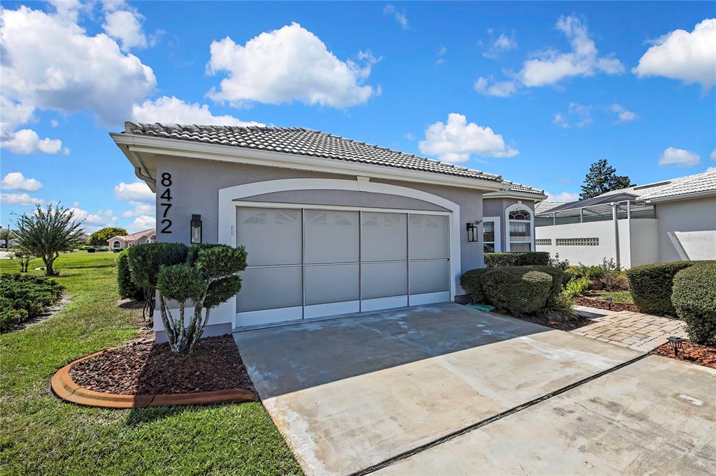 8472 Maybelle Drive Weeki Wachee, FL 34613 - Photo 43 of 58 a front view of a house with entertaining space