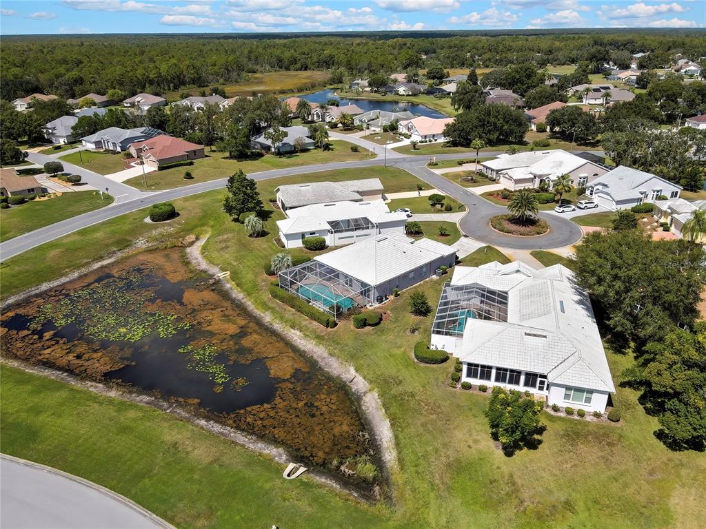 8472 Maybelle Drive Weeki Wachee, FL 34613 - Photo 53 of 58 an aerial view of residential houses with outdoor space