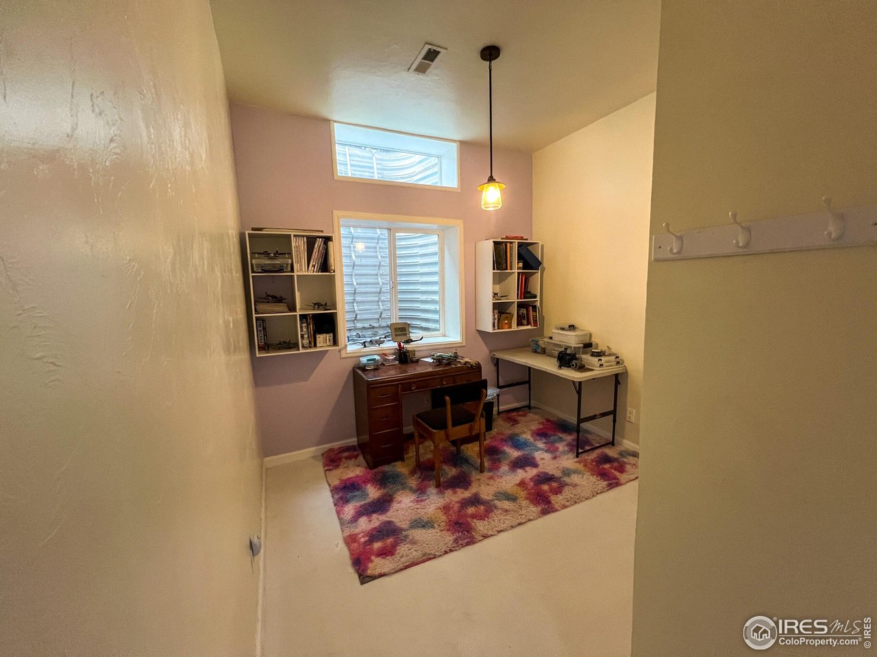 27667 Buckhorn Road Bellvue, CO 80512 - Photo 17 of 40 a view of a dining room with furniture