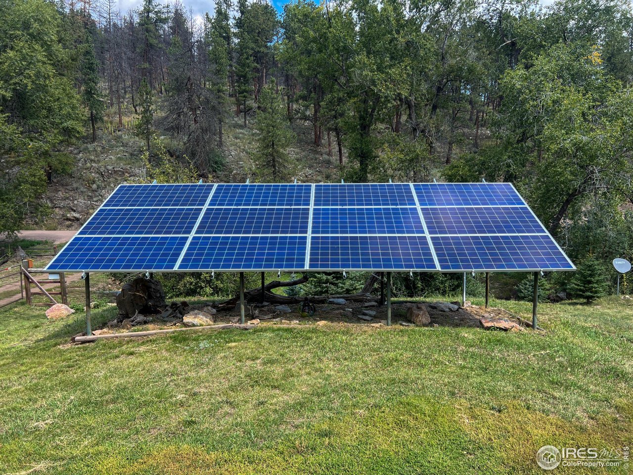 27667 Buckhorn Road Bellvue, CO 80512 - Photo 40 of 40 a backyard of a house