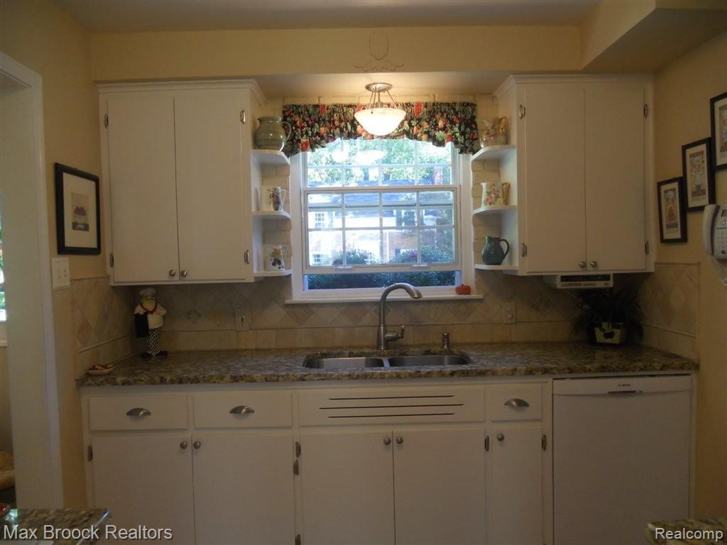 3875 Cumberland Road Berkley, MI 48072 - Photo 11 of 36 White Kitchen w/Granit Counters