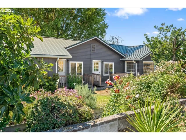 a house view with a garden space