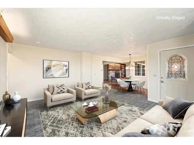 a living room with furniture and a couch