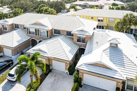 a view of a large building with a park