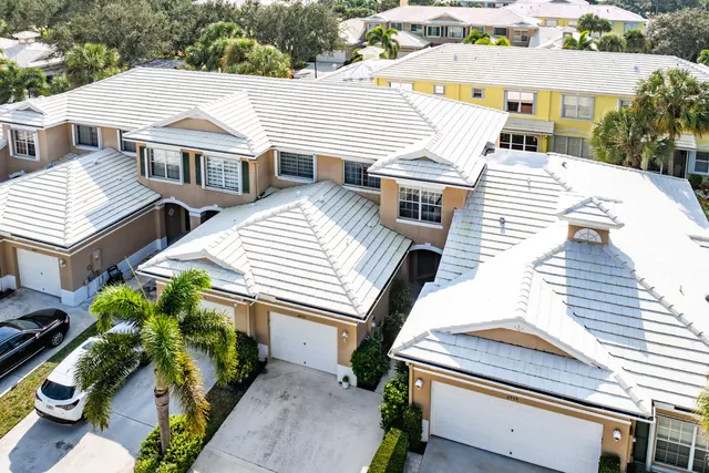 a view of a large building with a park