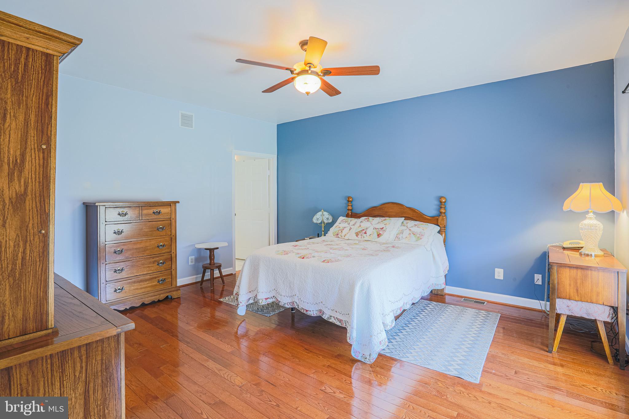 426 Foster Branch Road Joppa, MD 21085 - Photo 22 of 44 First floor master bedroom, hardwood floors!
