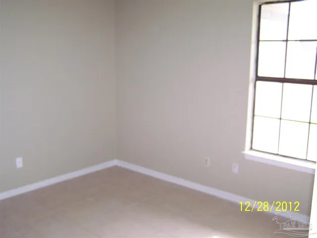 a view of front door and bedroom