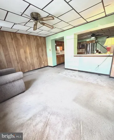 a view of a couches and table in a patio