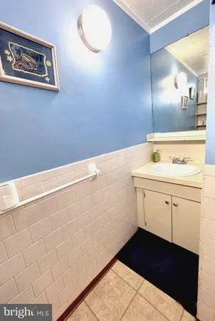 a utility room with cabinets