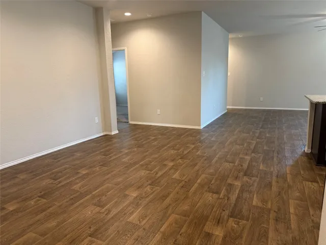a view of a livingroom with wooden floor