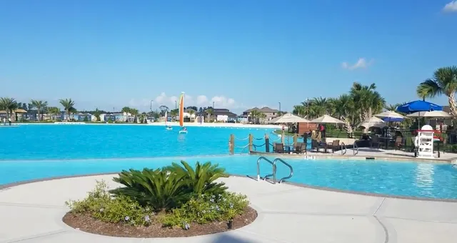 a view of a swimming pool with a patio
