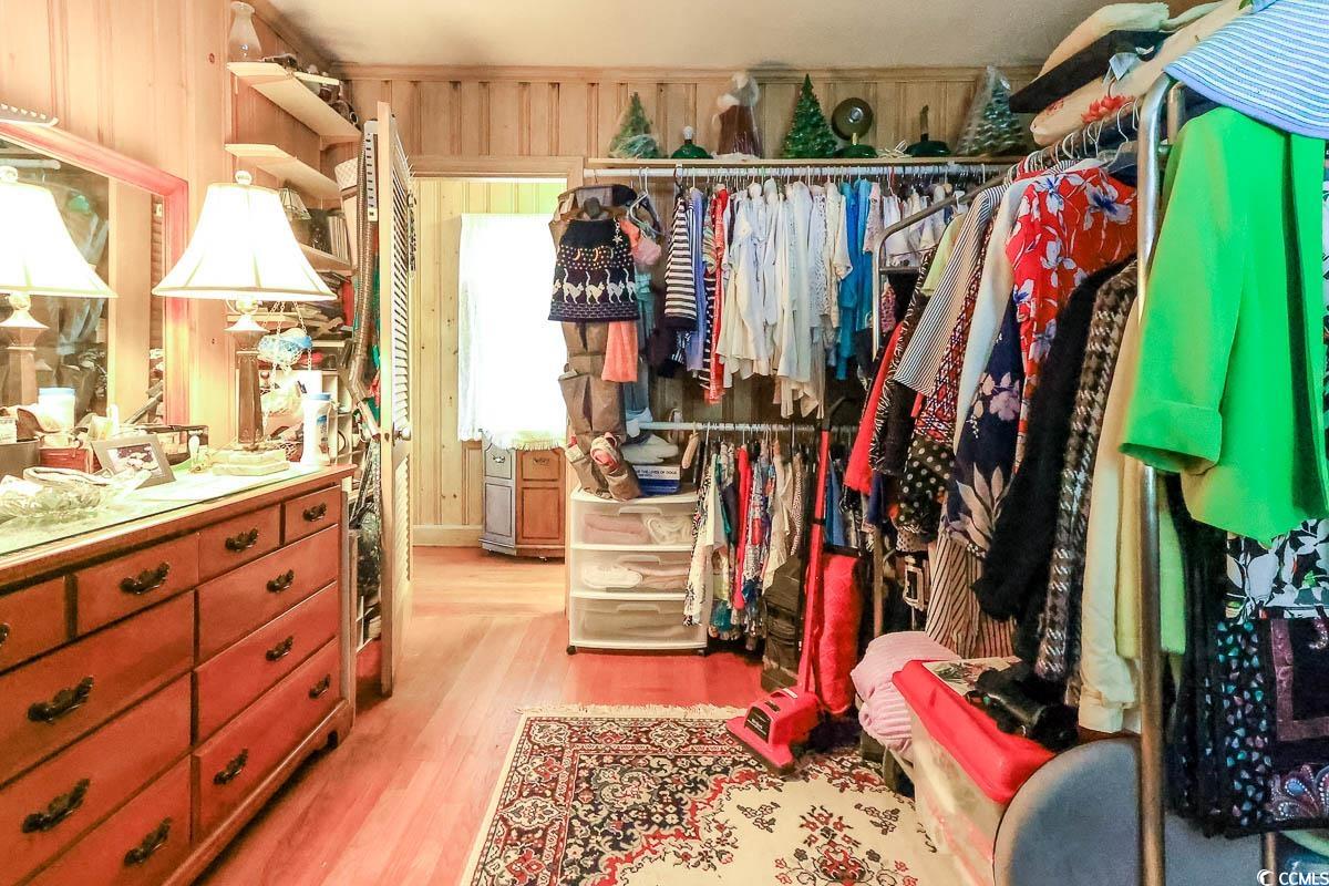 404 13th Avenue South Myrtle Beach, SC 29577 - Photo 13 of 39 Walk in closet with light wood finished floors