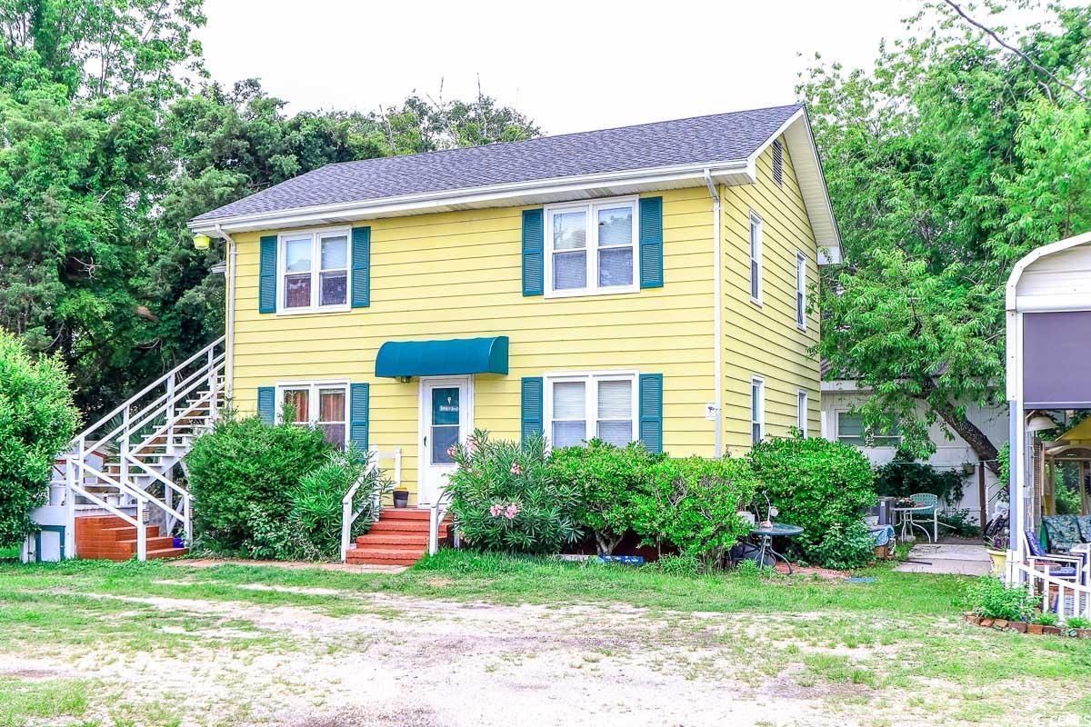 404 13th Avenue South Myrtle Beach, SC 29577 - Photo 24 of 39 View of front of house featuring stairs