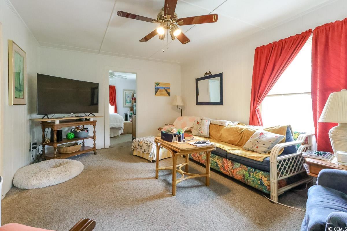 404 13th Avenue South Myrtle Beach, SC 29577 - Photo 30 of 39 Living room with a ceiling fan and carpet floors