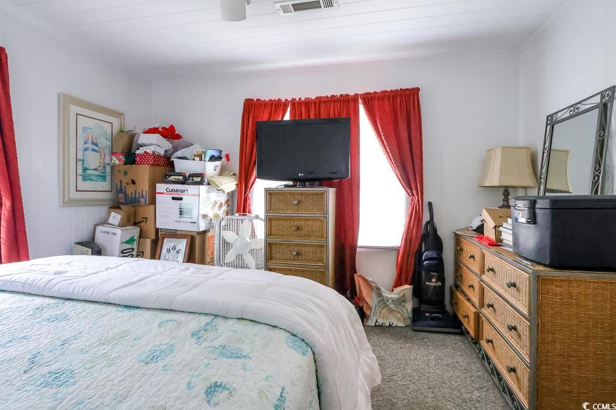 404 13th Avenue South Myrtle Beach, SC 29577 - Photo 33 of 39 Bedroom with carpet