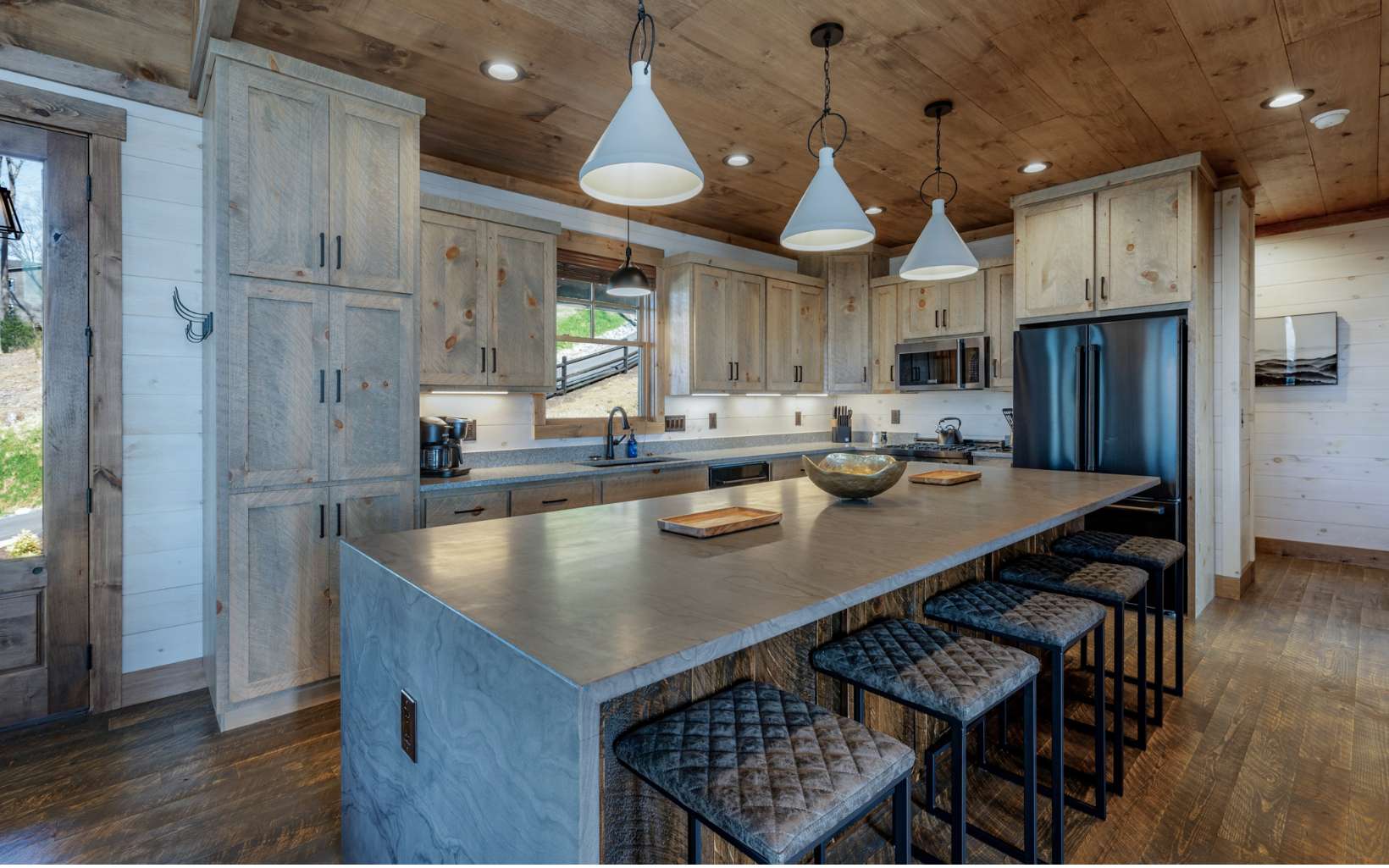 814 Overlook Drive Blue Ridge, GA 30513 - Photo 11 of 53 a kitchen with stainless steel appliances granite countertop a sink a refrigerator and a stove