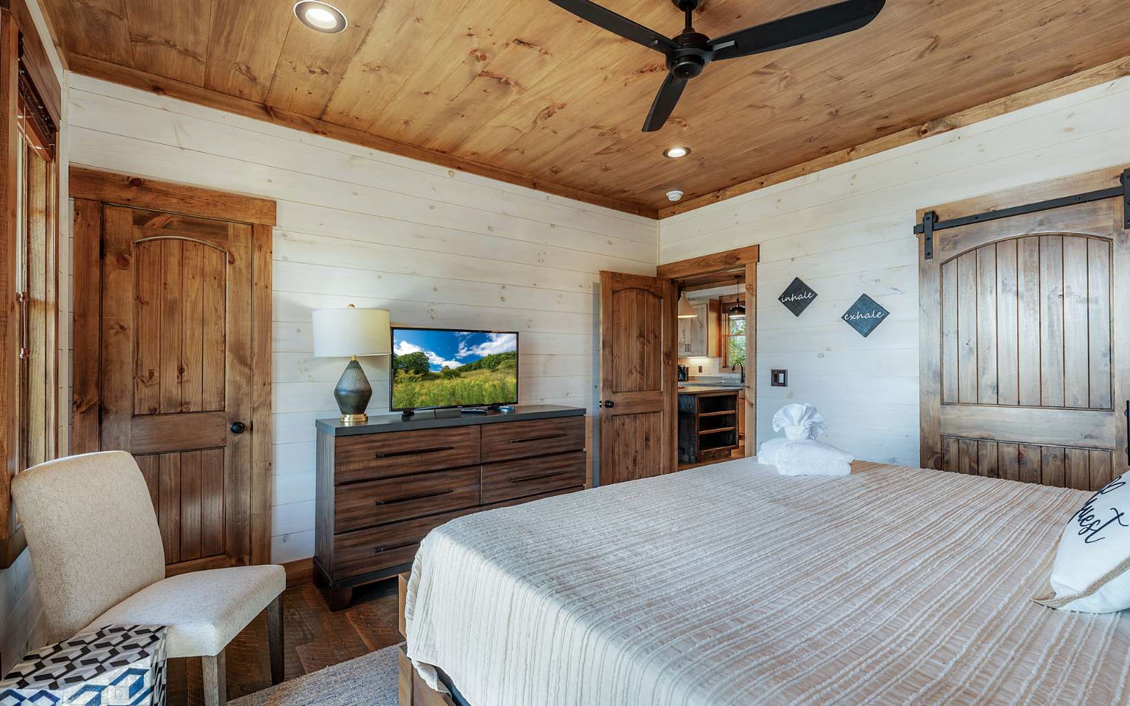 814 Overlook Drive Blue Ridge, GA 30513 - Photo 15 of 53 a bedroom with a bed and wooden floor