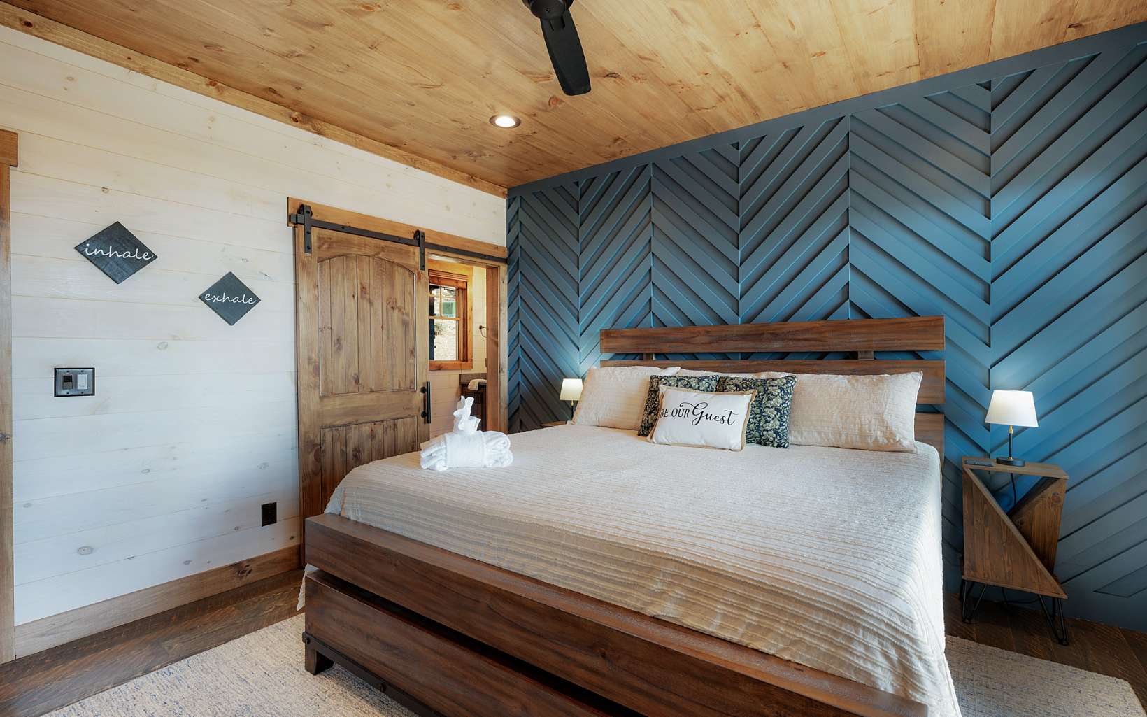 814 Overlook Drive Blue Ridge, GA 30513 - Photo 16 of 53 a bedroom with a bed and wooden floor