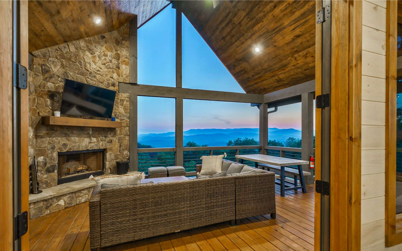 814 Overlook Drive Blue Ridge, GA 30513 - Photo 2 of 53 a living room with fireplace furniture and a floor to ceiling window