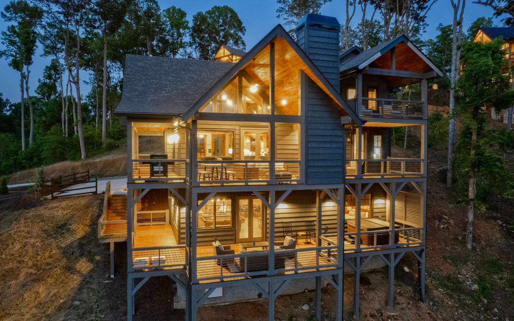 814 Overlook Drive Blue Ridge, GA 30513 - Photo 3 of 53 a view of a chairs and table in a patio