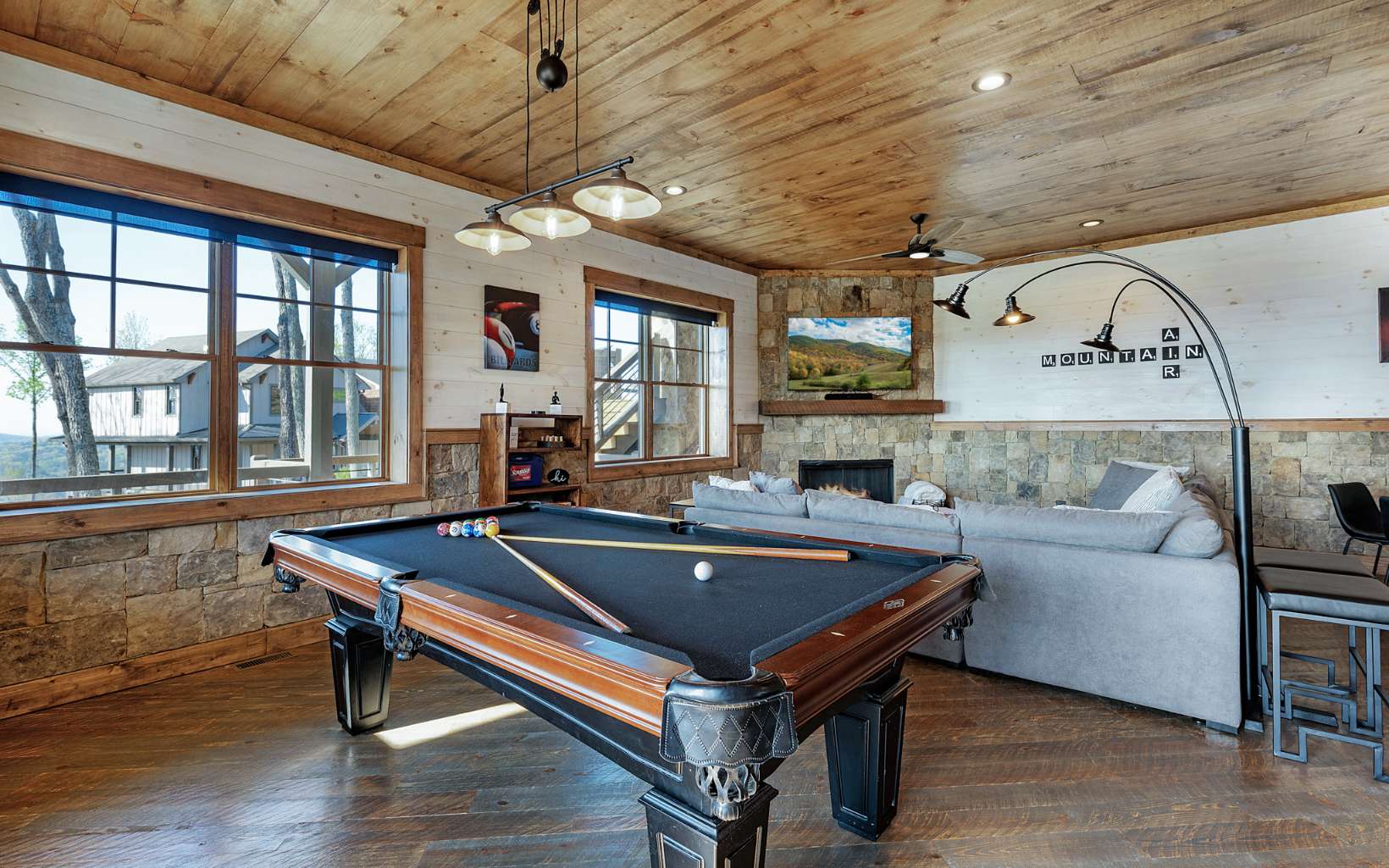 814 Overlook Drive Blue Ridge, GA 30513 - Photo 34 of 53 a living room with furniture a table and wooden floor