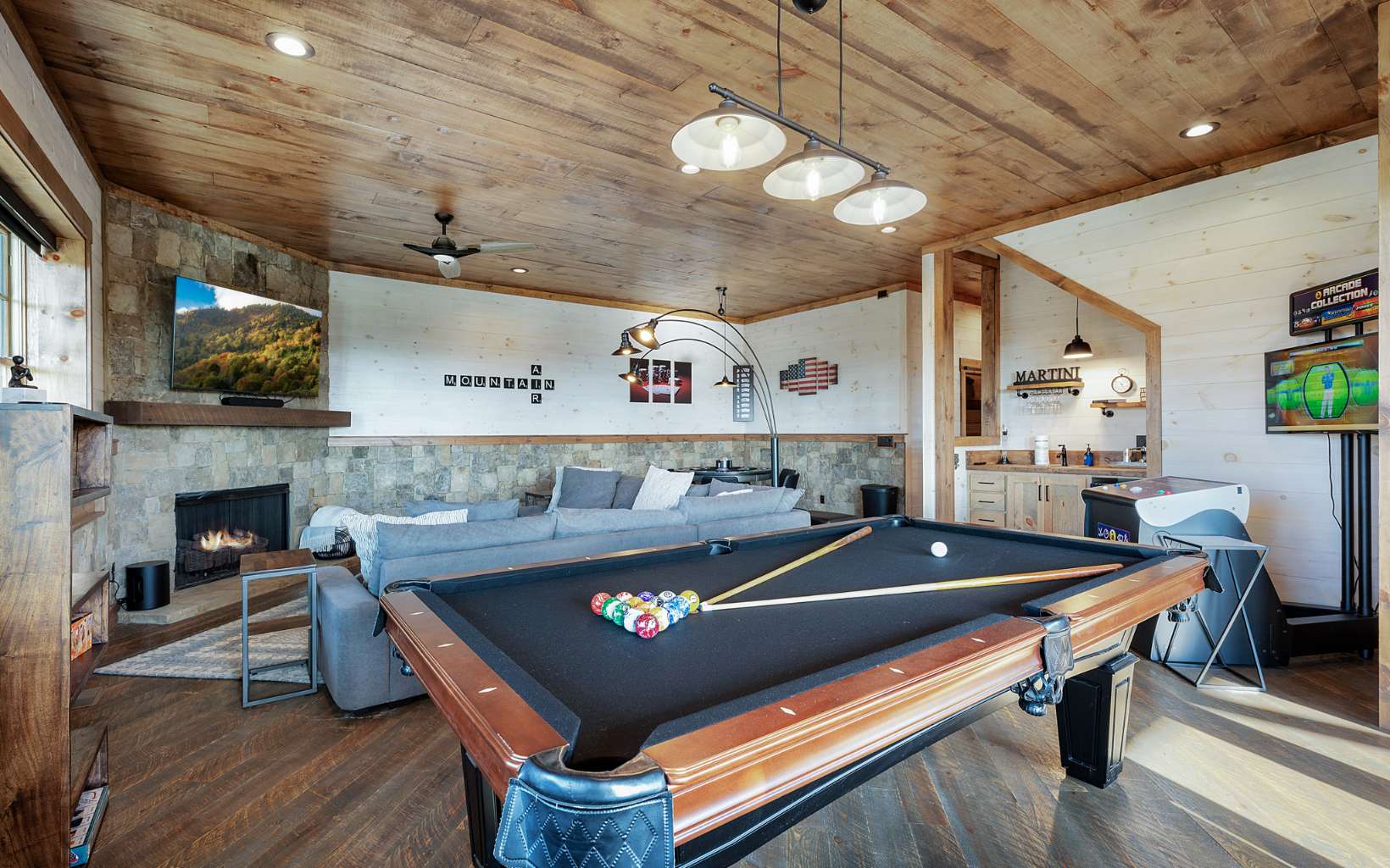 814 Overlook Drive Blue Ridge, GA 30513 - Photo 35 of 53 a room with stainless steel appliances kitchen island granite countertop furniture and a fireplace