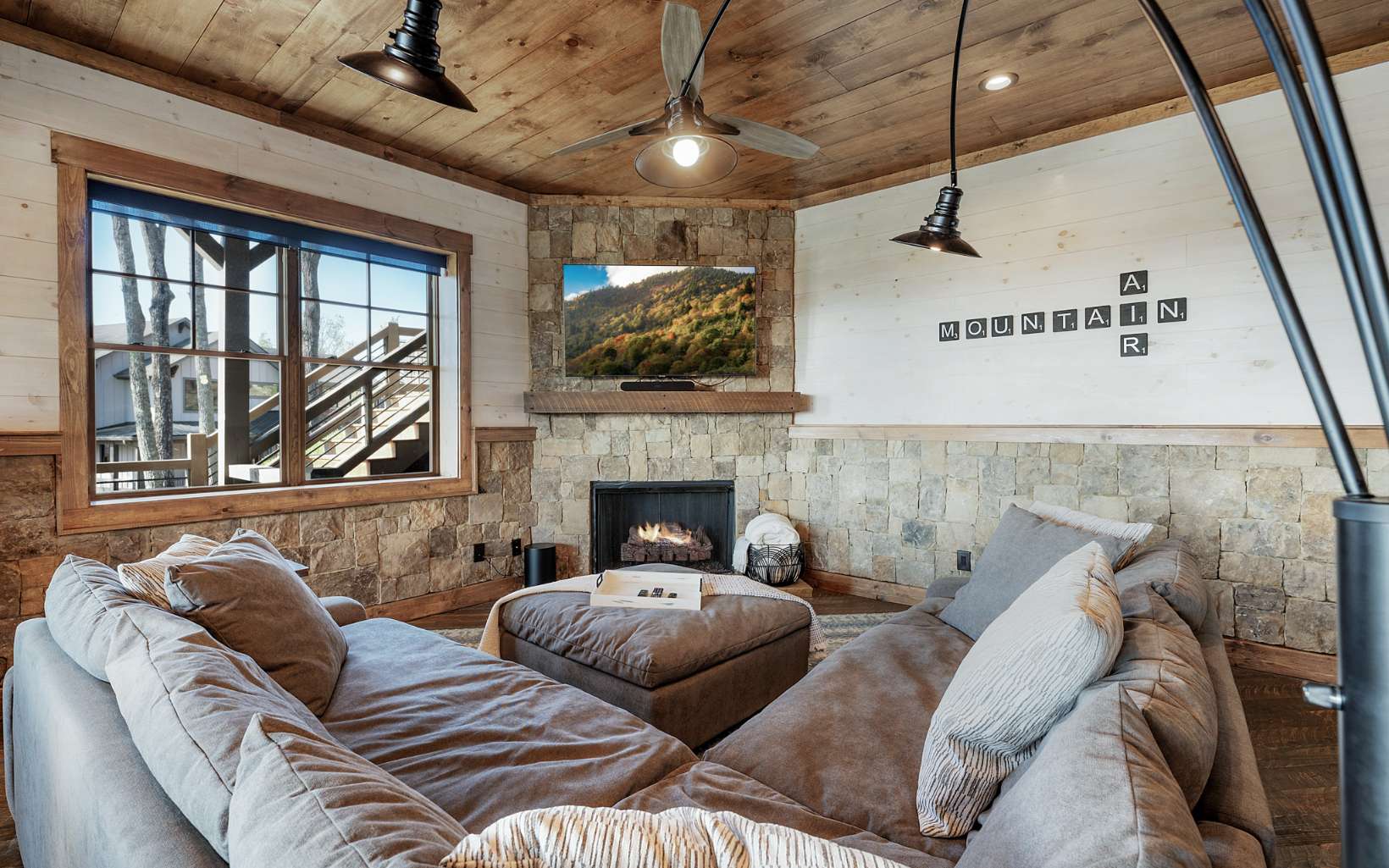 814 Overlook Drive Blue Ridge, GA 30513 - Photo 37 of 53 a living room with furniture and a fireplace