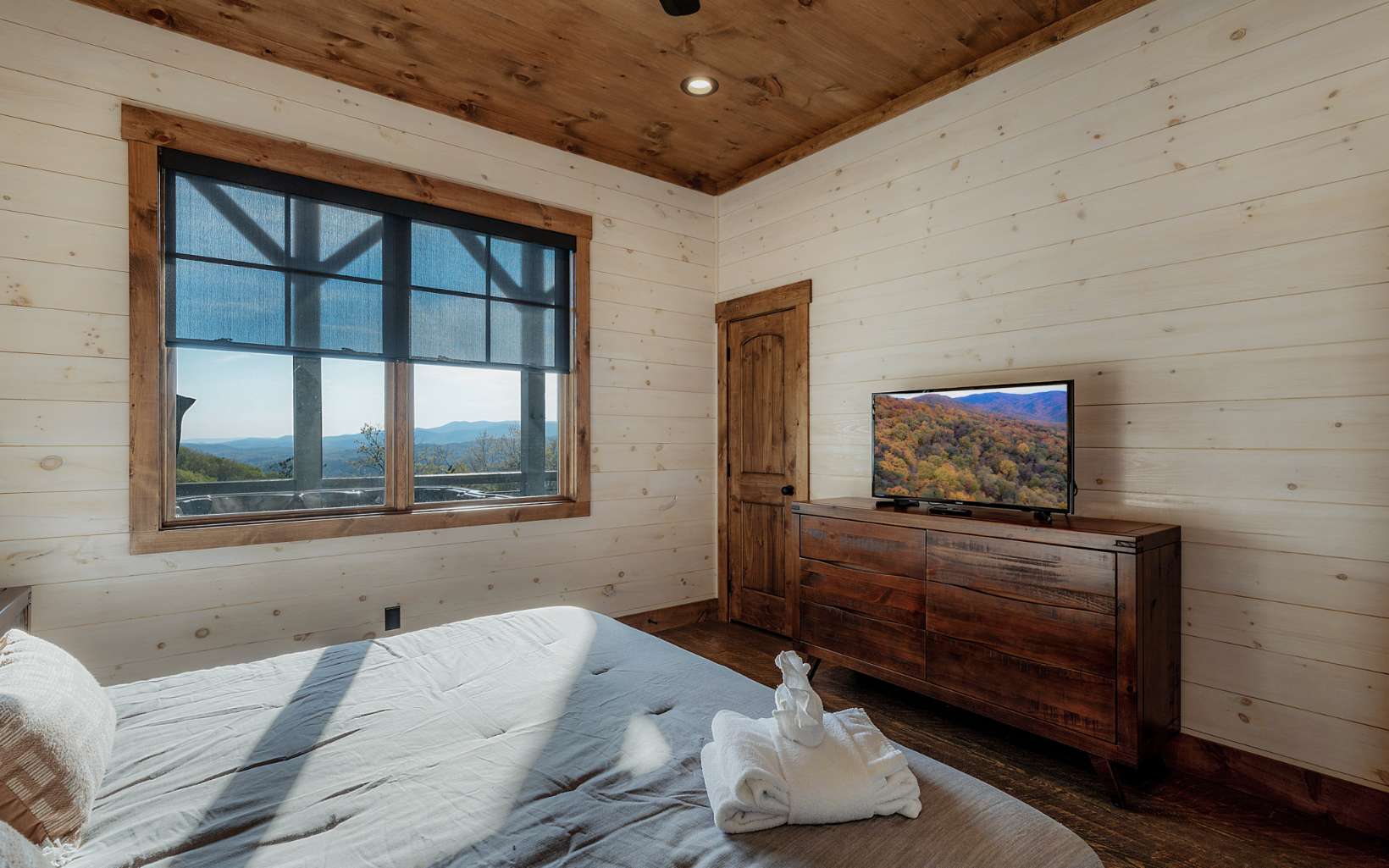 814 Overlook Drive Blue Ridge, GA 30513 - Photo 47 of 53 a bedroom with furniture and a flat screen tv