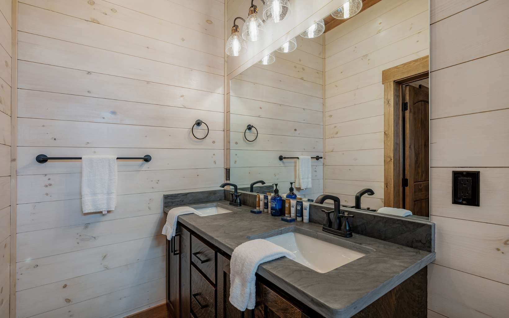814 Overlook Drive Blue Ridge, GA 30513 - Photo 48 of 53 a bathroom with a sink and a mirror