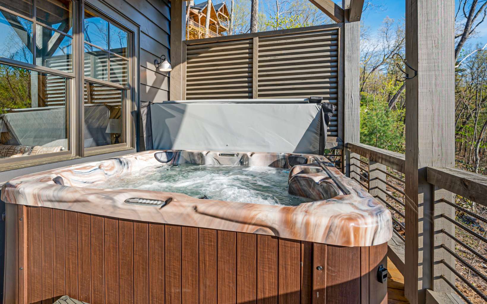 814 Overlook Drive Blue Ridge, GA 30513 - Photo 50 of 53 a view of a patio with table and chairs with wooden floor and fence