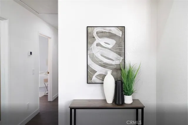a potted plant sitting on top of a shelf