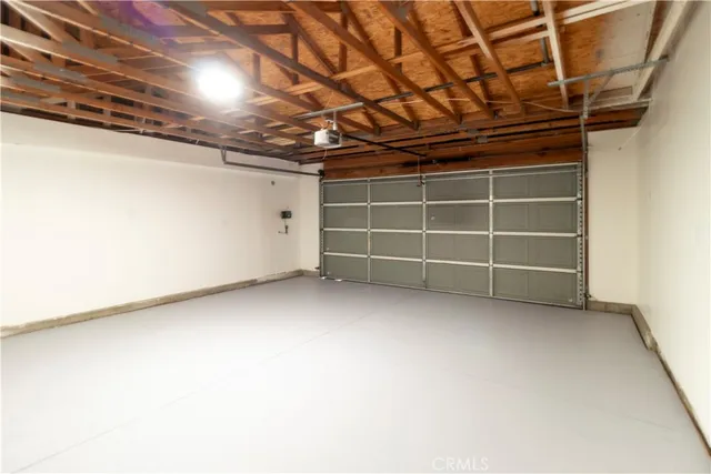 a view of an empty room with a staircase