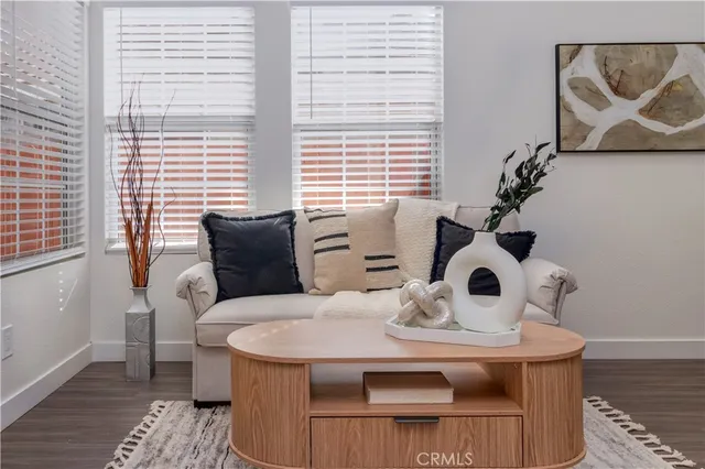 a view of a dining room with furniture and window