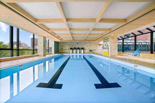 a view of a swimming pool with a porch