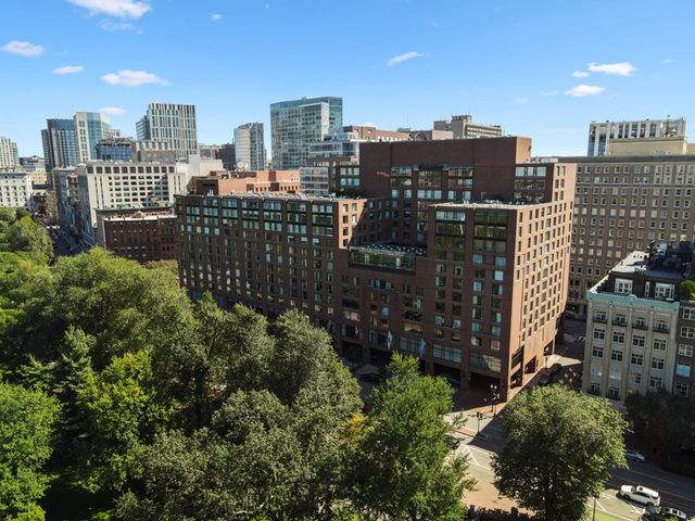 a view of a city with tall buildings